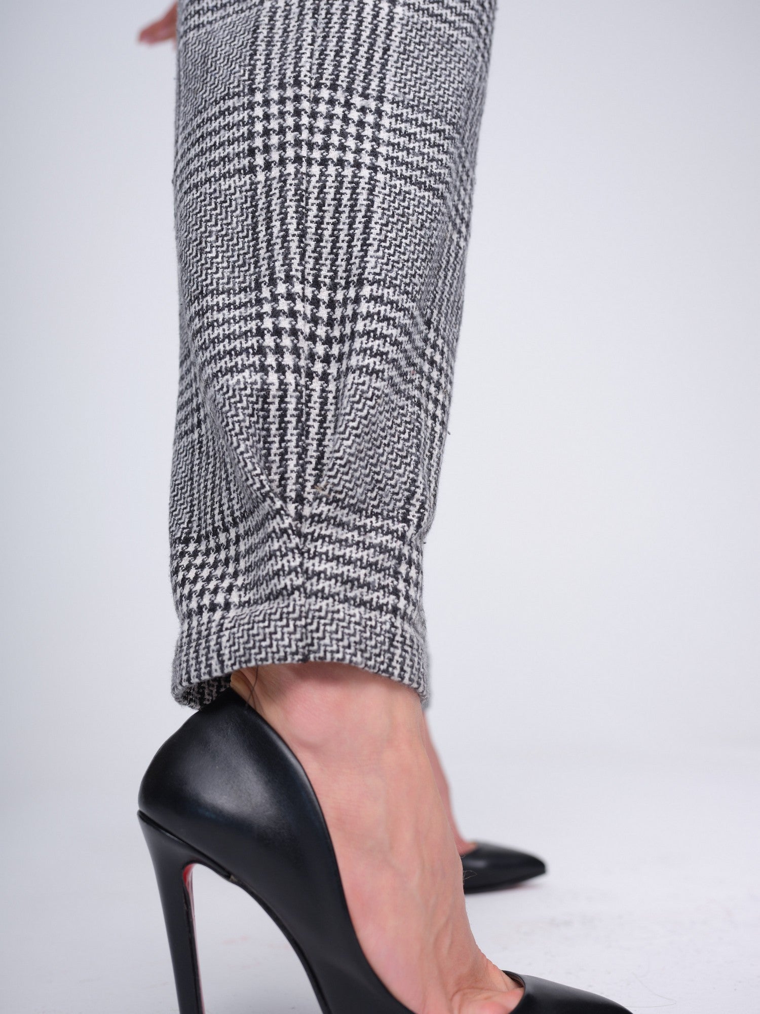 Women's high-waisted black and white plaid tailored trousers