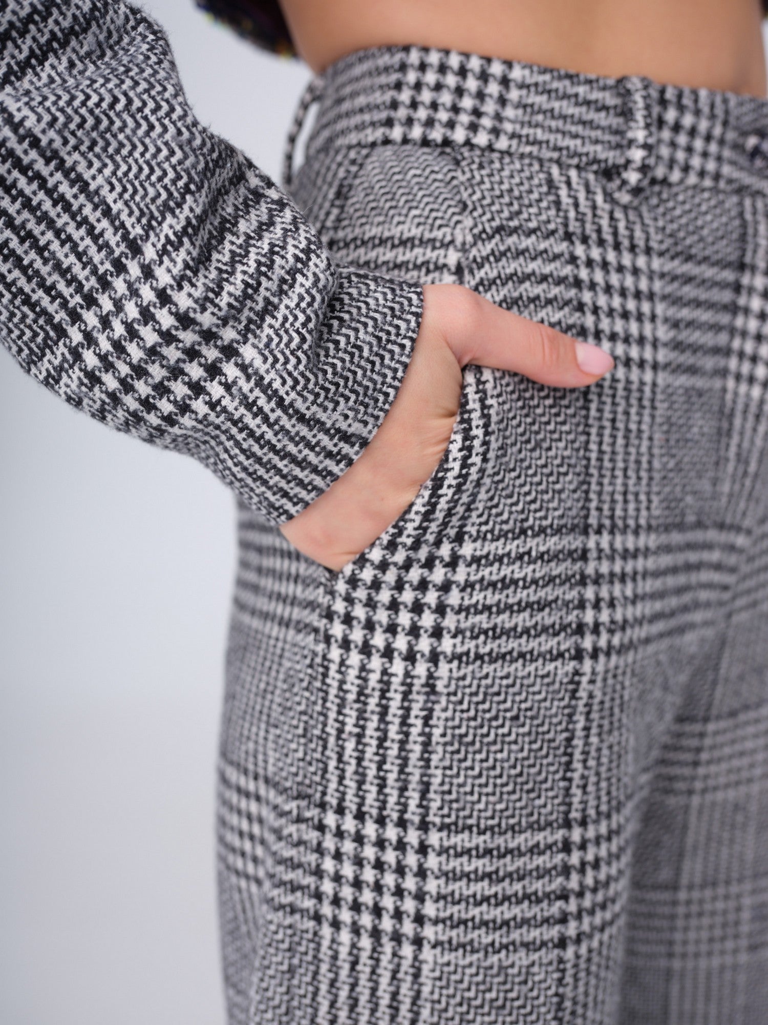 Women's high-waisted black and white plaid tailored trousers