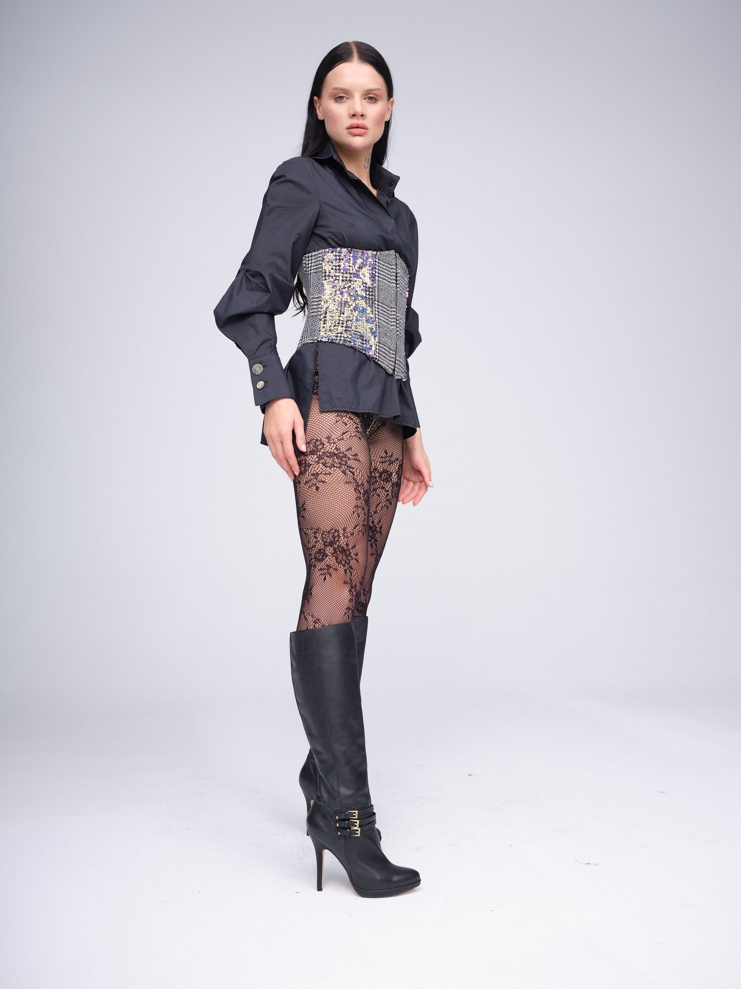 Monochrome check corset with iridescent sequins and front hook closures.