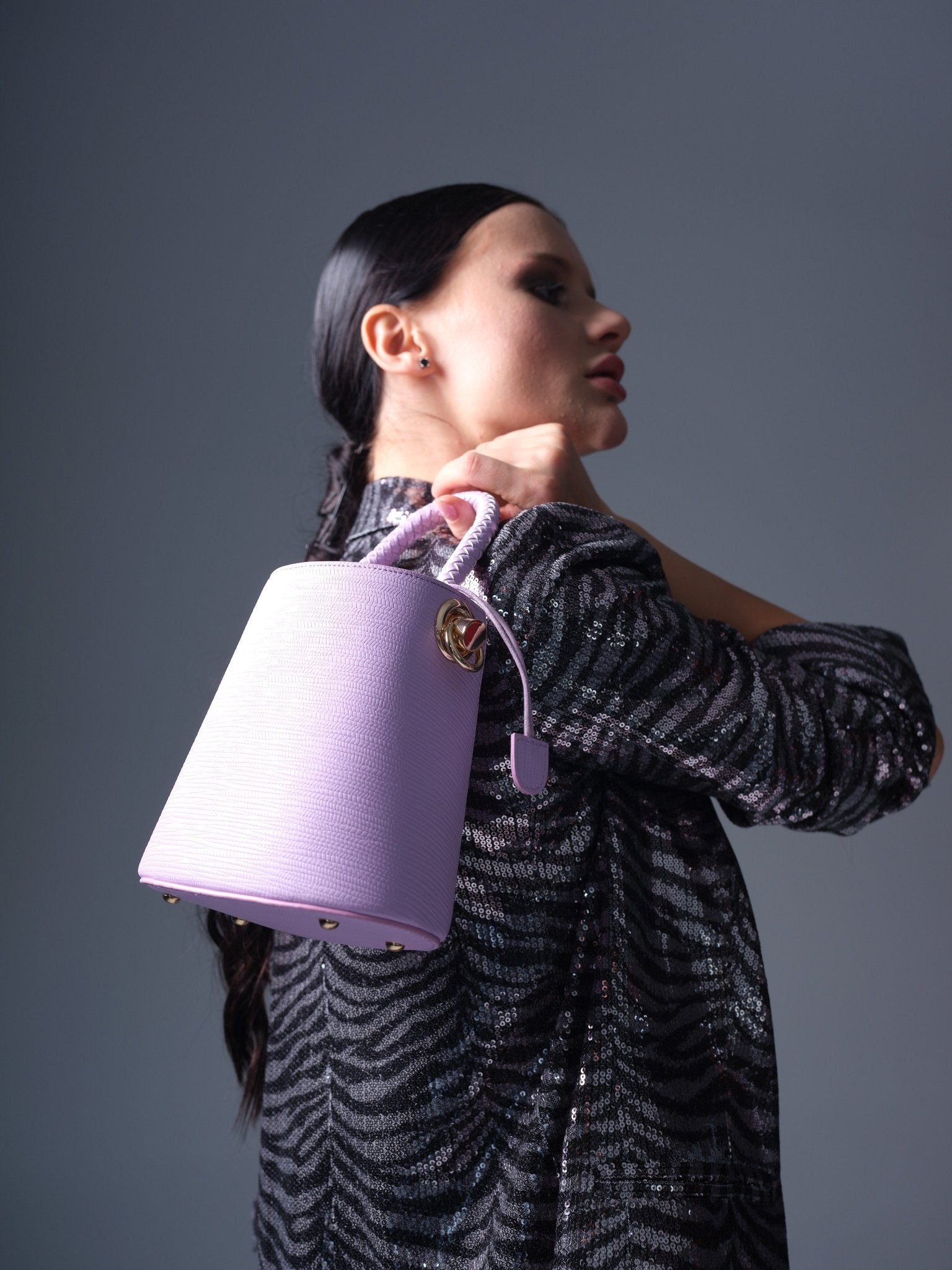 Purple vegan leather bucket bag with braided handle